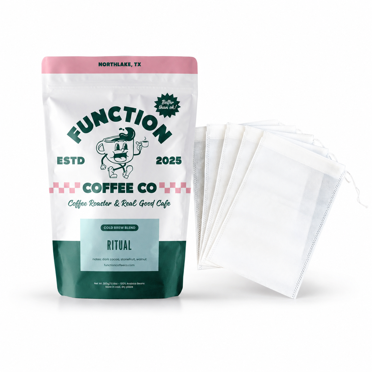 A stand-up pouch of Function Coffee Co Ritual coffee roast with a pink top band, dark green bottom section, and white center, shown next to four white drawstring filter bags on a clean white background.