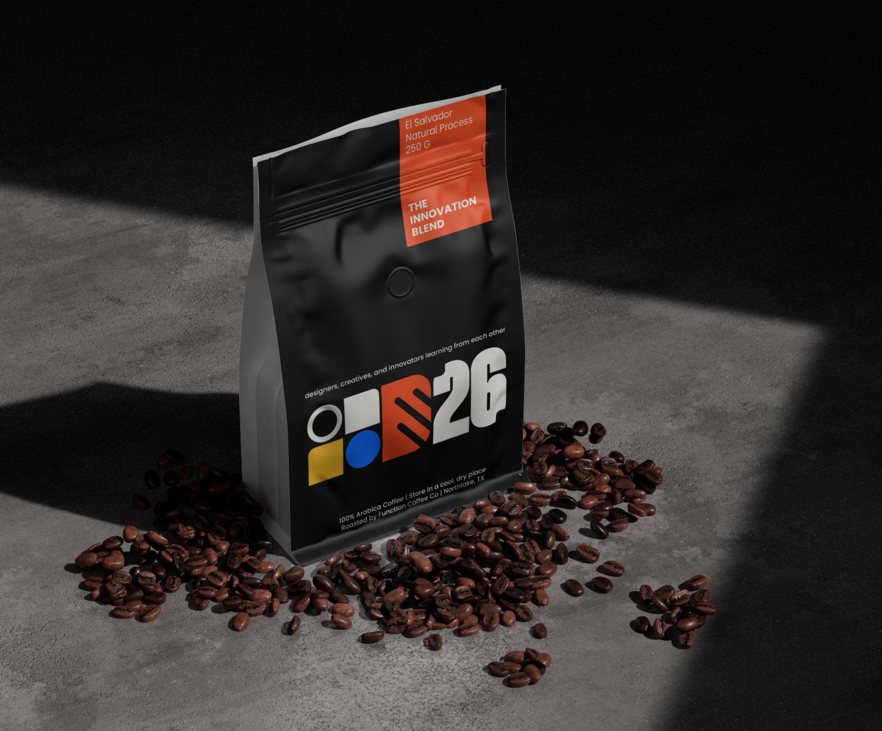 Coffee bag with 'Our26' branding surrounded by coffee beans on a dark surface