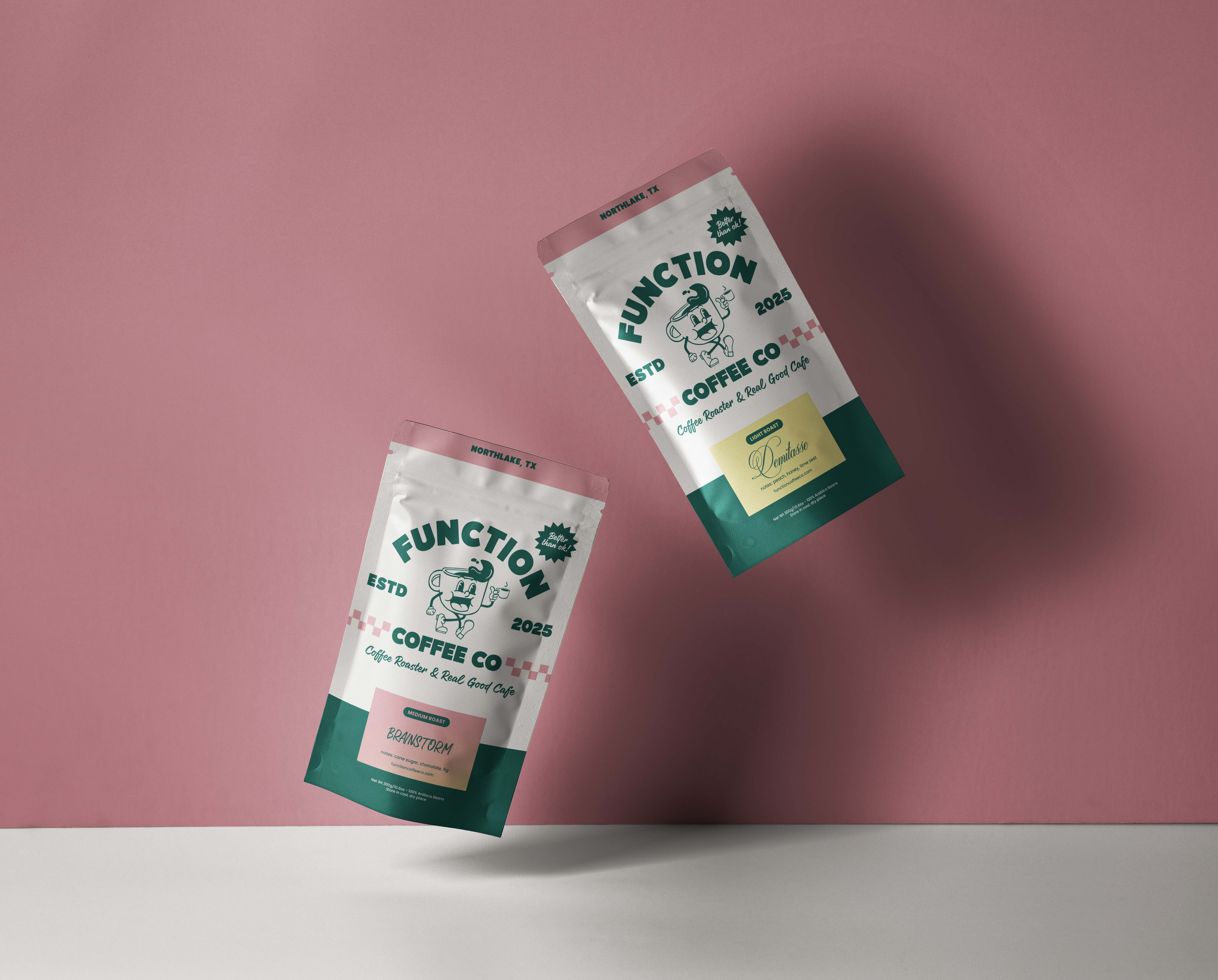 TwoFunction Coffee Co. coffee bags on a pink background